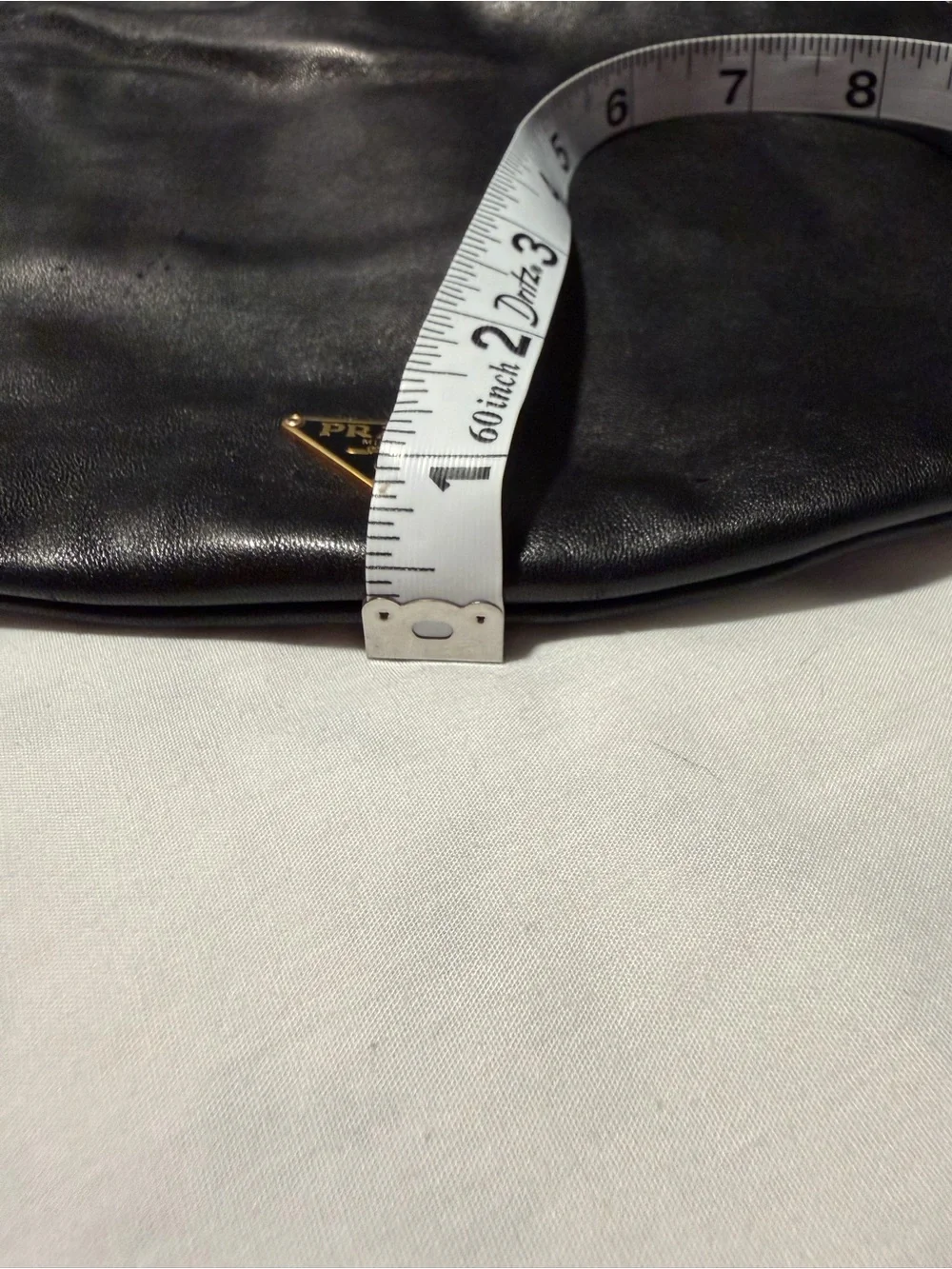 Prada Black Leather Hobo with Gold Chain Accent and dust bag .